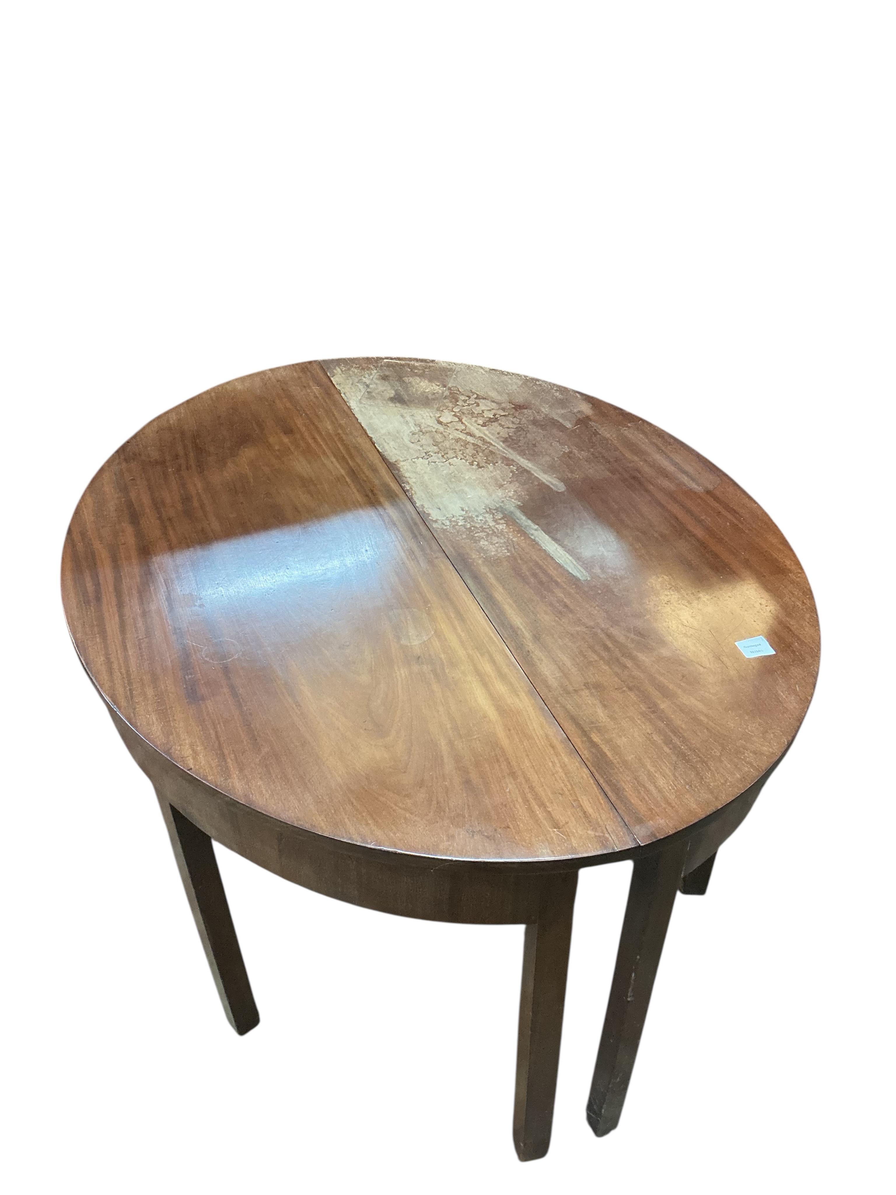 A George III mahogany D end extending dining table, 208cm extended, two spare leaves, depth 131cm, height 72cm